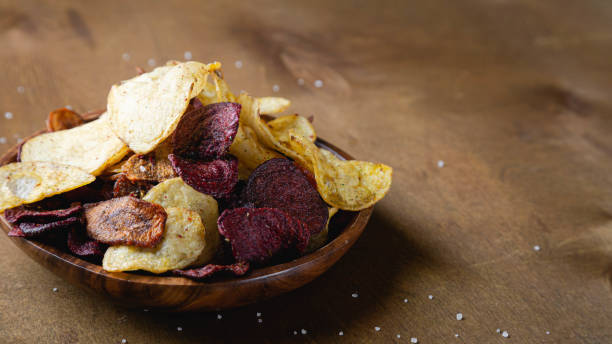 istock Vegetable chips made from potatoes, beets, carrots 1292725133
