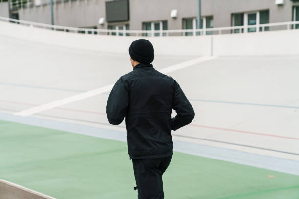 istock Athletic sportsman running while working out at stadium 1292725241