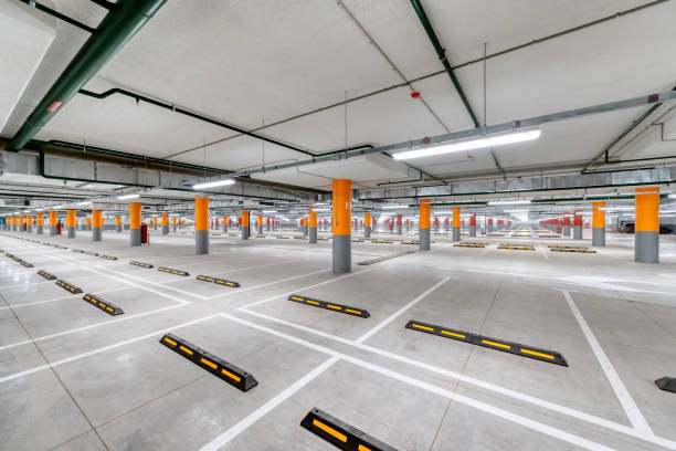 istock Large underground parking for cars 1292727099