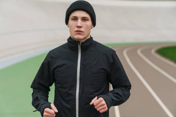 istock Handsome athletic sportsman running while working out 1292727158