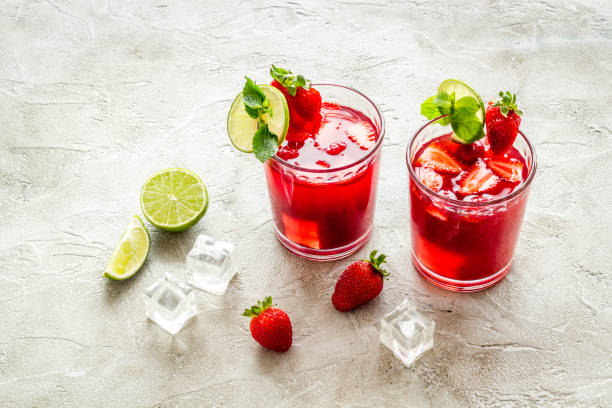istock Fresh strawberry cocktail drink with ice, top view 1292728460