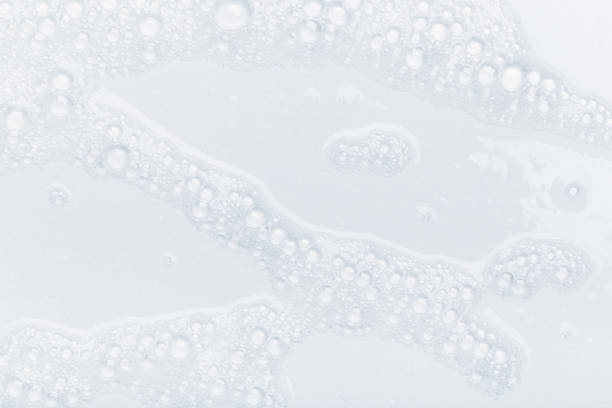 istock Foam bubble from soap or shampoo for washing isolated on white background from above 1292730825
