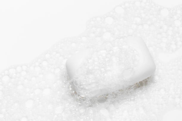 istock Soap bar and foam on white background, top view. Mockup for design 1292730833
