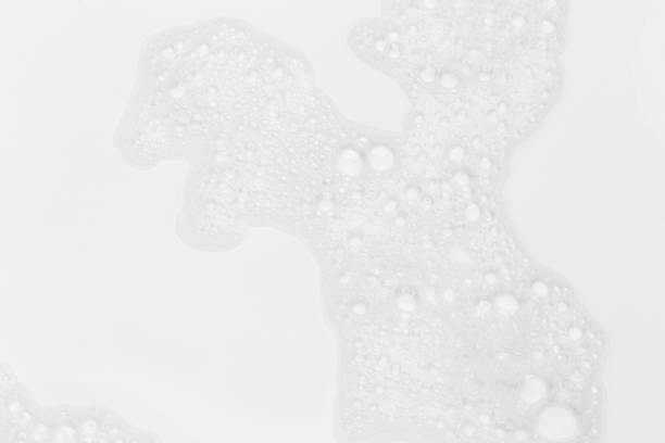 istock Foam bubble from soap or shampoo for washing isolated on white background from above 1292730841