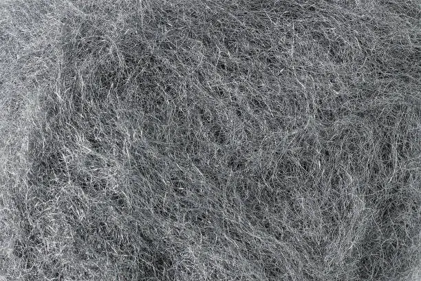 Steel wool strands texture. Wire wool abrasive material industrial background