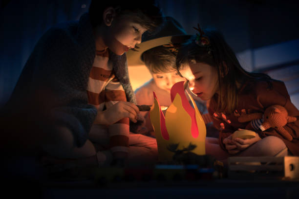 istock Cute kids play camping in kids room 1292731996