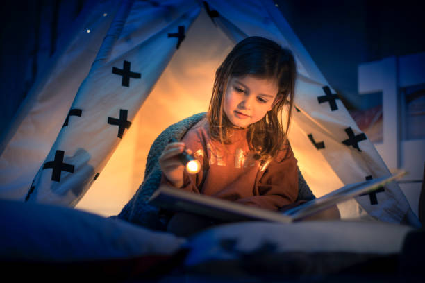 istock Cute kids play camping in kids room 1292732052
