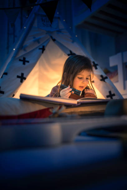 istock Cute kids play camping in kids room 1292732067