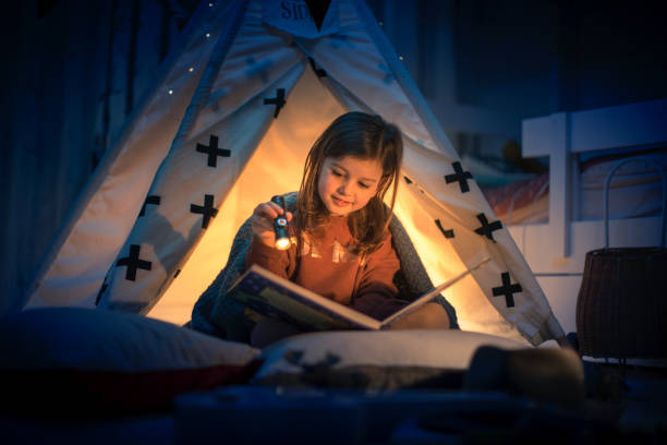 istock Cute kids play camping in kids room 1292732084
