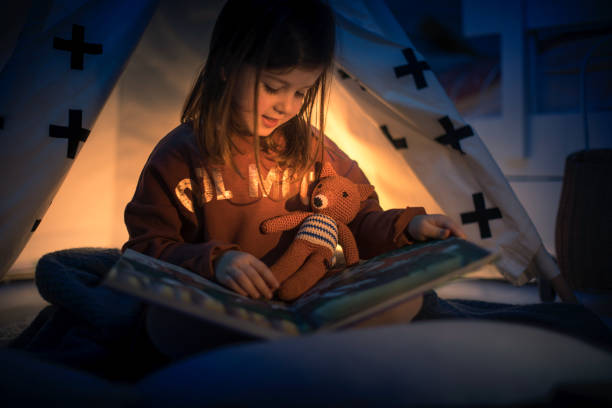 istock Cute kids play camping in kids room 1292732156
