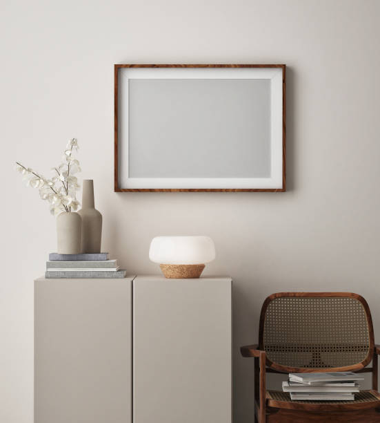 istock mock up poster frame in modern interior background, scandinavian style, 3D render 1292733239