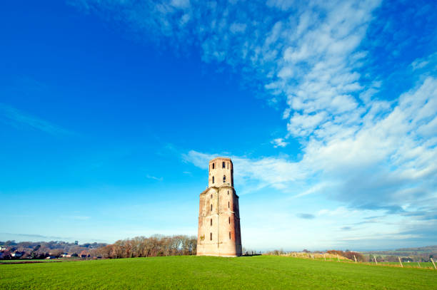 istock Horton folly tower under cloudscape, Horton, Dorset, England 1292736904