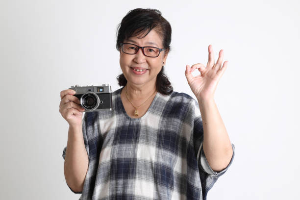 asijská žena - štětkotvaré fotky - stock snímky, obrázky a fotky