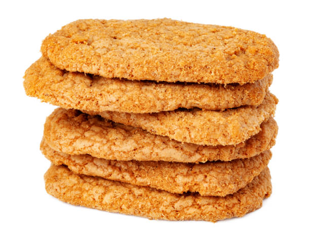 istock Stack of oat cookies isolated on white background 1292738055