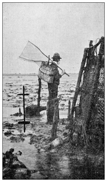 istock Antique dotprinted black and white photograph: Fishing 1292739830