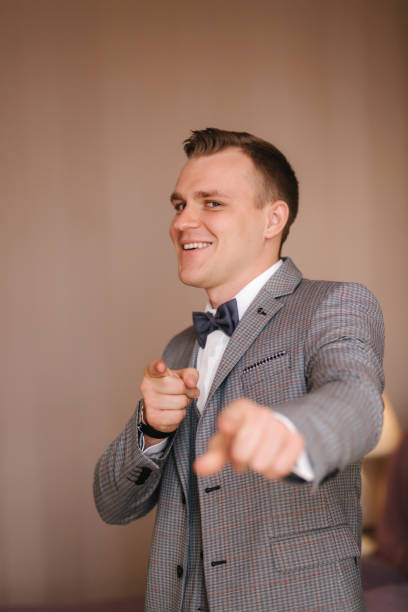 istock Handsome groom dressed in hotel. Wedding day 1292739967