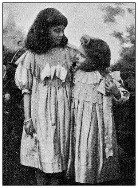 istock Antique dotprinted black and white photograph: sisters 1292740339