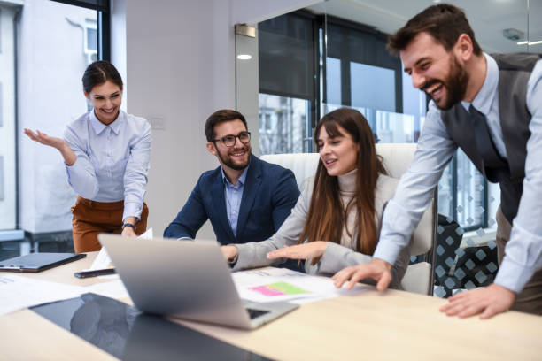 istock Yong coworkers happy to work together. 1292741208