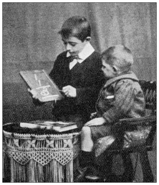 istock Antique dotprinted black and white photograph: Young teacher 1292741240