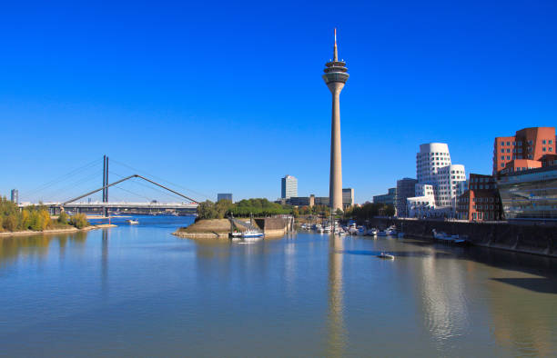 istock skyline of Duesseldorf with rhine and harbor 1292742363