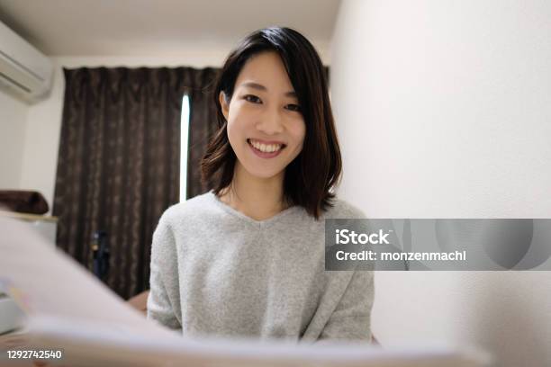 Woman Talking In Video Call Stock Photo - Download Image Now - Japanese Ethnicity, Women, Talking