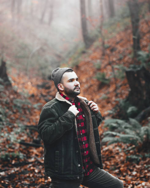 istock Young Male Hiker On Cold Autumn Day Exploring Forest 1292742582