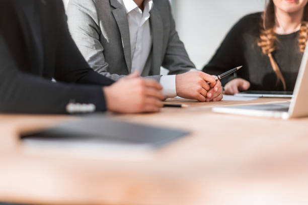 istock close up. working group discussing something at a group meeting 1292743623