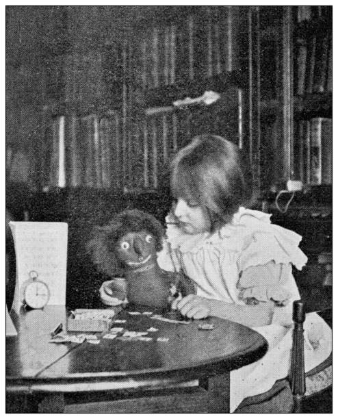istock Antique dotprinted black and white photograph: Girl with puppet toy 1292747097