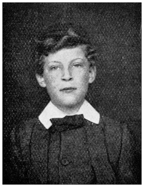 istock Antique dotprinted black and white photograph: Boy portrait 1292748360