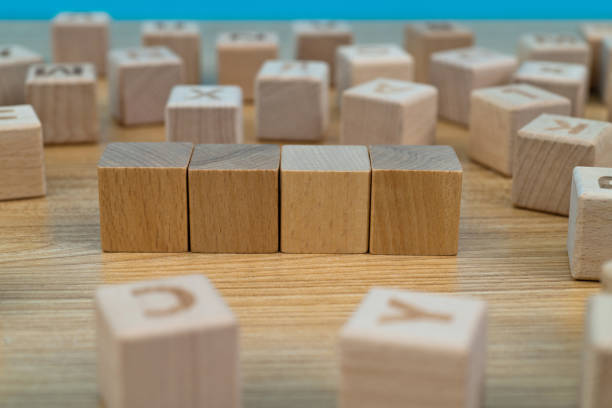 istock Four blank wooden blocks on the table 1292748433