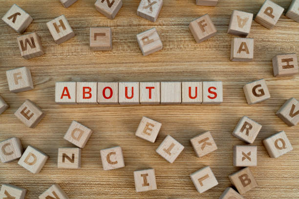 istock Wooden blocks with word about us 1292748602