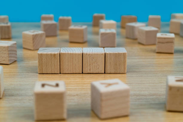 istock Four blank wooden blocks on the table 1292749526