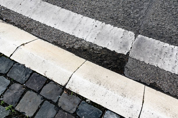 istock Weathered Road Marking Full Frame in Detail 1292749871