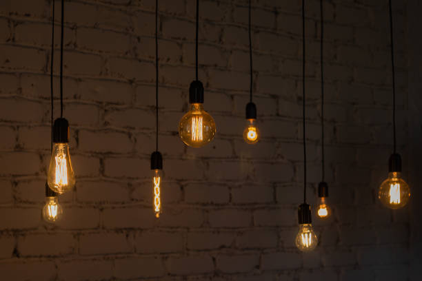 istock Edison vintage lamp on a dark background 1292749919