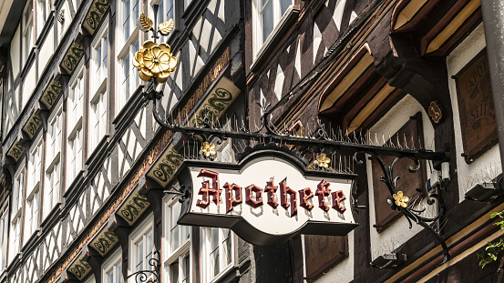 Beutiful antique pharmacy Sign on a house facade in Germany