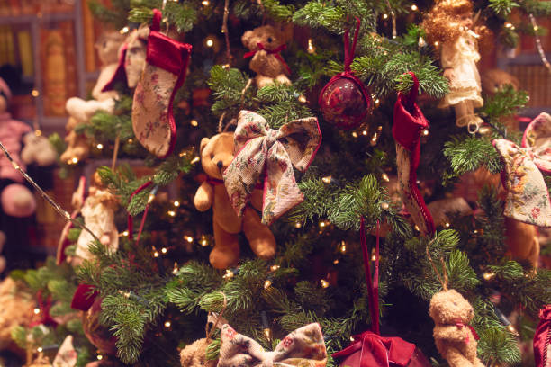 istock Christmas fir tree decorations with baubles and lights 1292751410