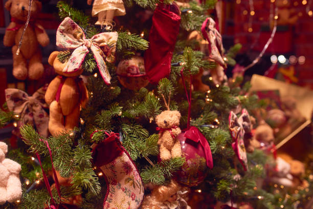istock Christmas fir tree decorations with baubles and lights 1292751413