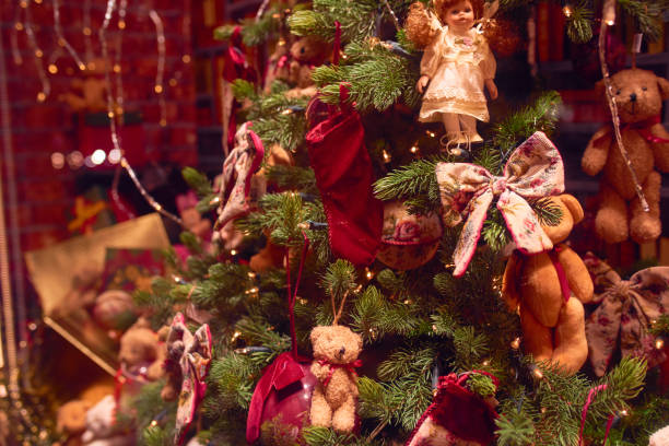 istock Christmas fir tree decorations with baubles and lights 1292751414