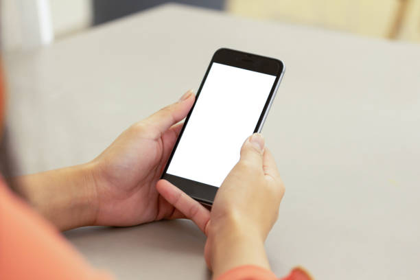 istock blank display new smart phone view in shopping mall 1292753803