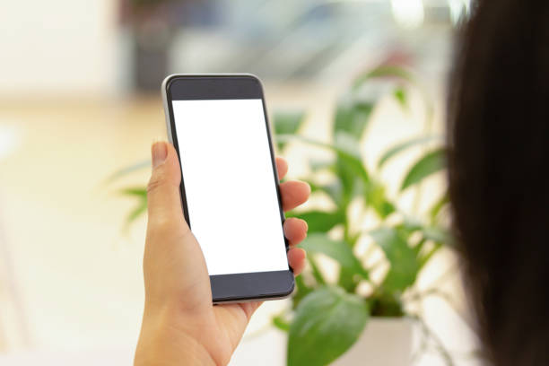istock blank display new smart phone view in shopping mall 1292753815
