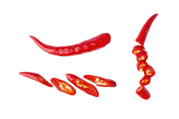 istock piece red  chili pepper sliced  fly on white isolated 1292753853