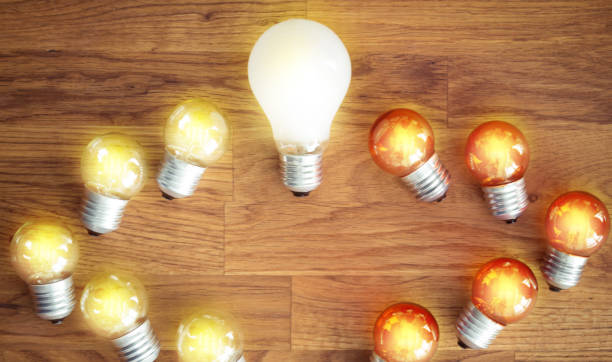 istock Light bulb concept Think differently and think outside the box Related to business . 1292755235