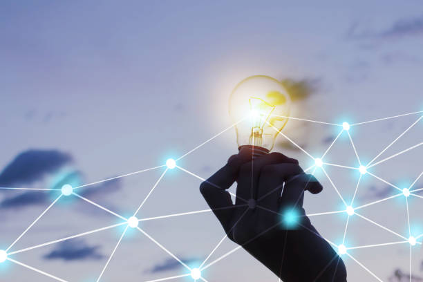 istock women holding light bulbs,creative idea  innovation with  technology in sunset time 1292755685