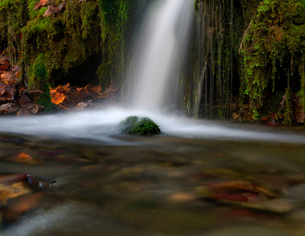 istock A small waterfall at autumn in jena germany europe 1292755851