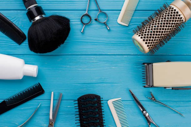istock Professional hairdresser tools on blue background. 1292757385