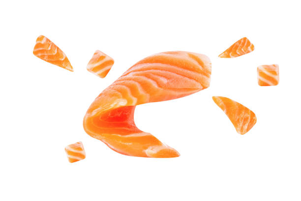 istock Salmon slices fly ingredient for sushi Salmon Clipping Path on white isolated .Image stack Full depth of field macro 1292758247