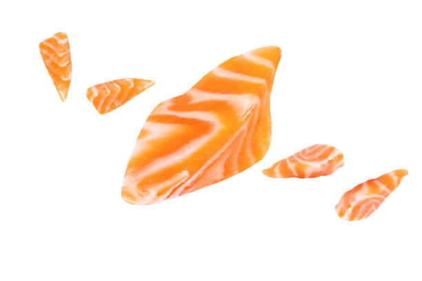 istock Fresh salmon filleted pieces  uncooked isolated salmon Clipping Path on white isolated .Image stack Full depth of field macro 1292758270
