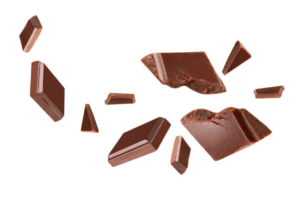 istock chocolate  Blast pieces in the air on a white background .Clipping path 1292758957