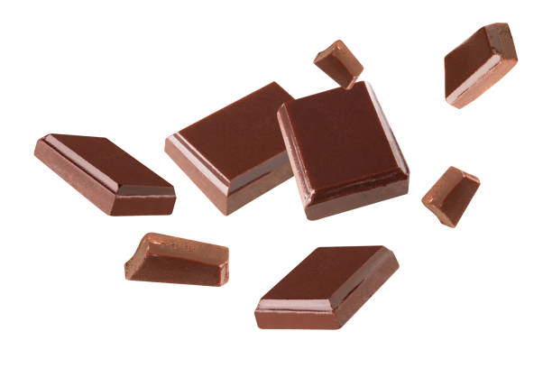 istock chocolate  Blast pieces in the air on a white background .Clipping path 1292758969