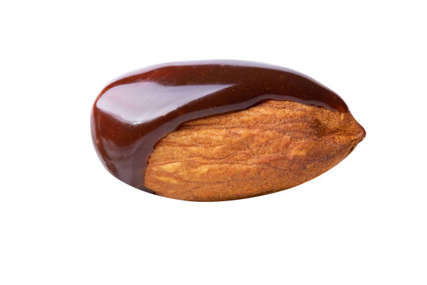 istock almond chocolate blast fly chocolate nuts isolated on white isolated 1292759001